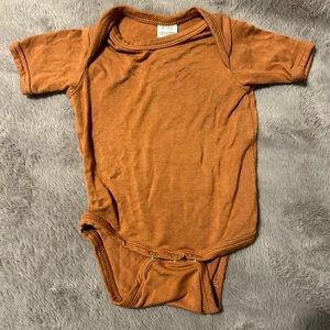 Kate Quinn NB onesie